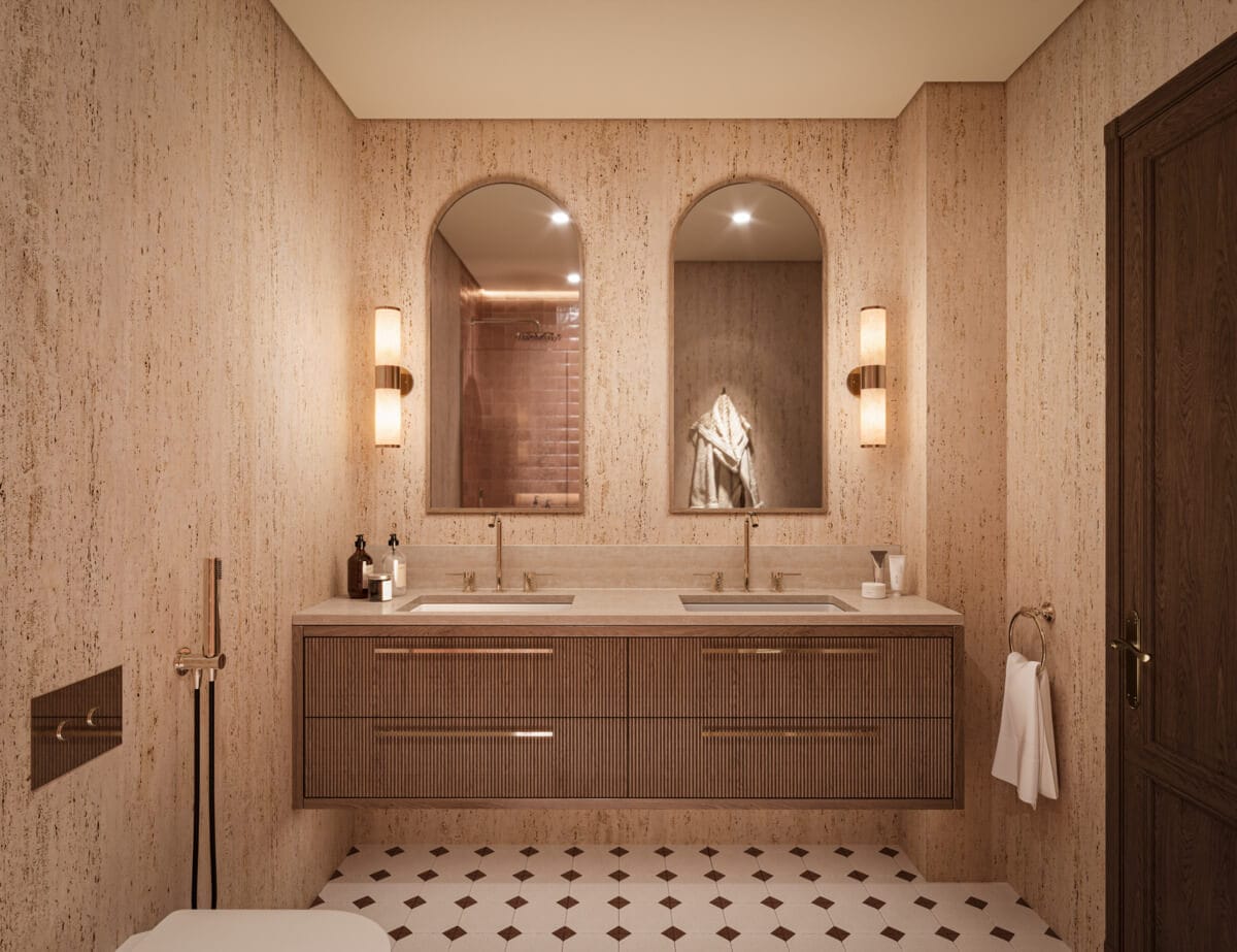 Baño residencial con mueble doble de madera, espejos arqueados y revestimiento pétreo